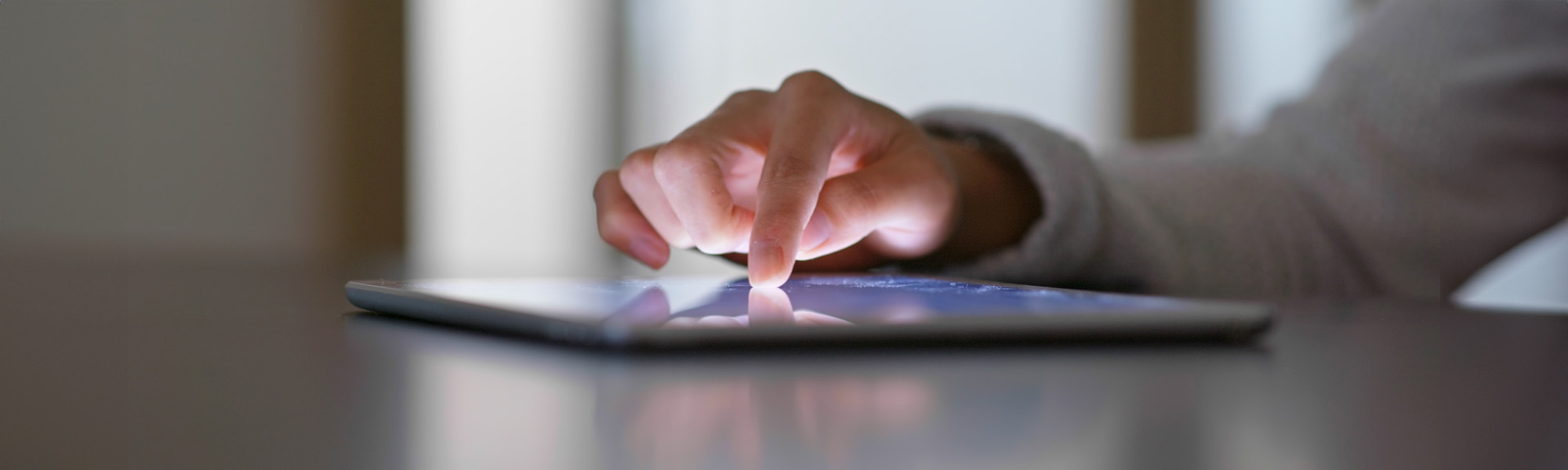 woman finger touch on tablet