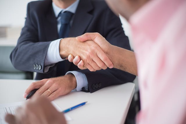 business people shaking hands